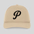 Beige cap with a black letter 'P' on a light gray background